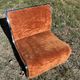 Chrome steel armchair and orange fabric by Vittorio Introini