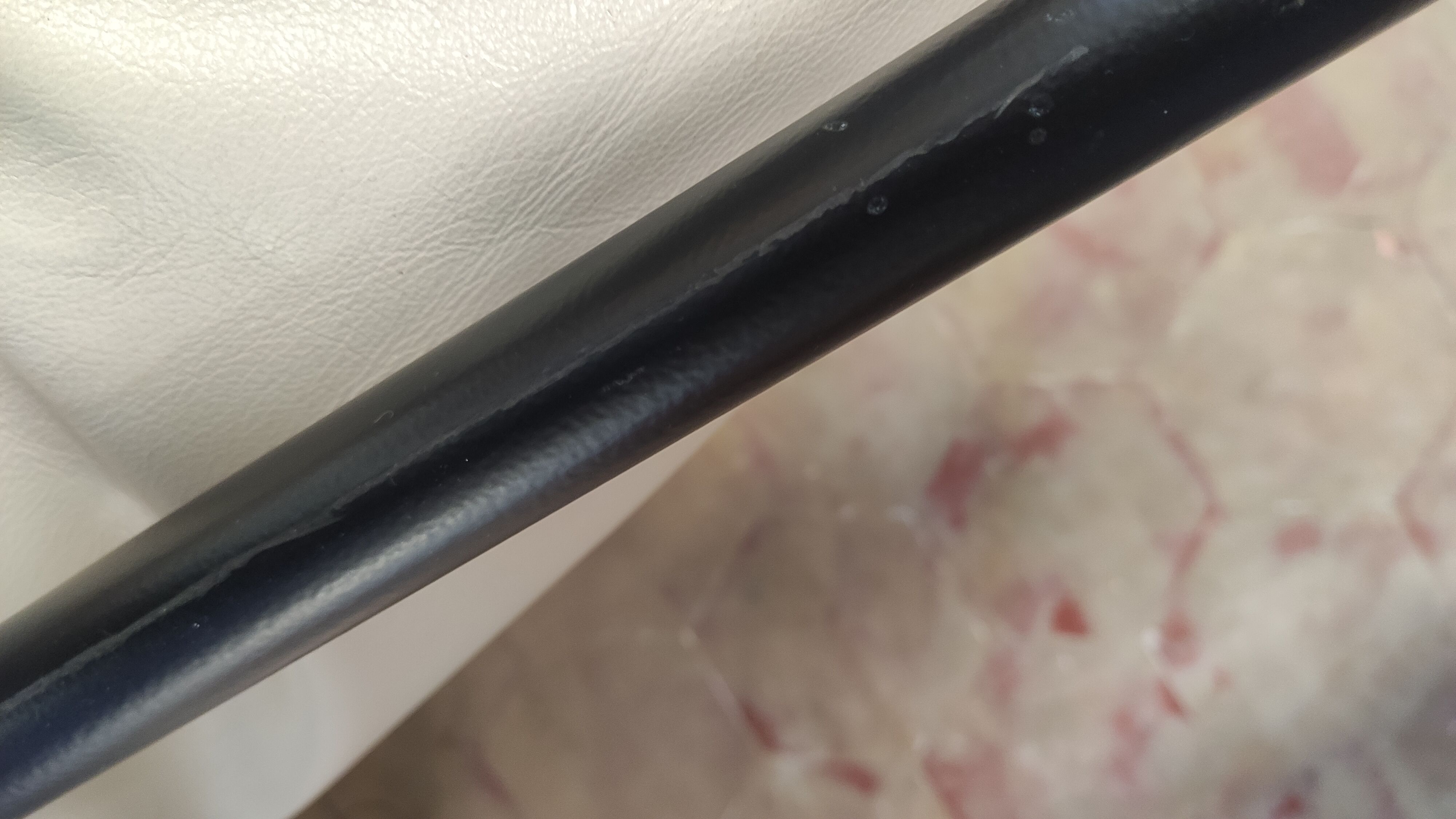 2-seater beige leather black metal frames