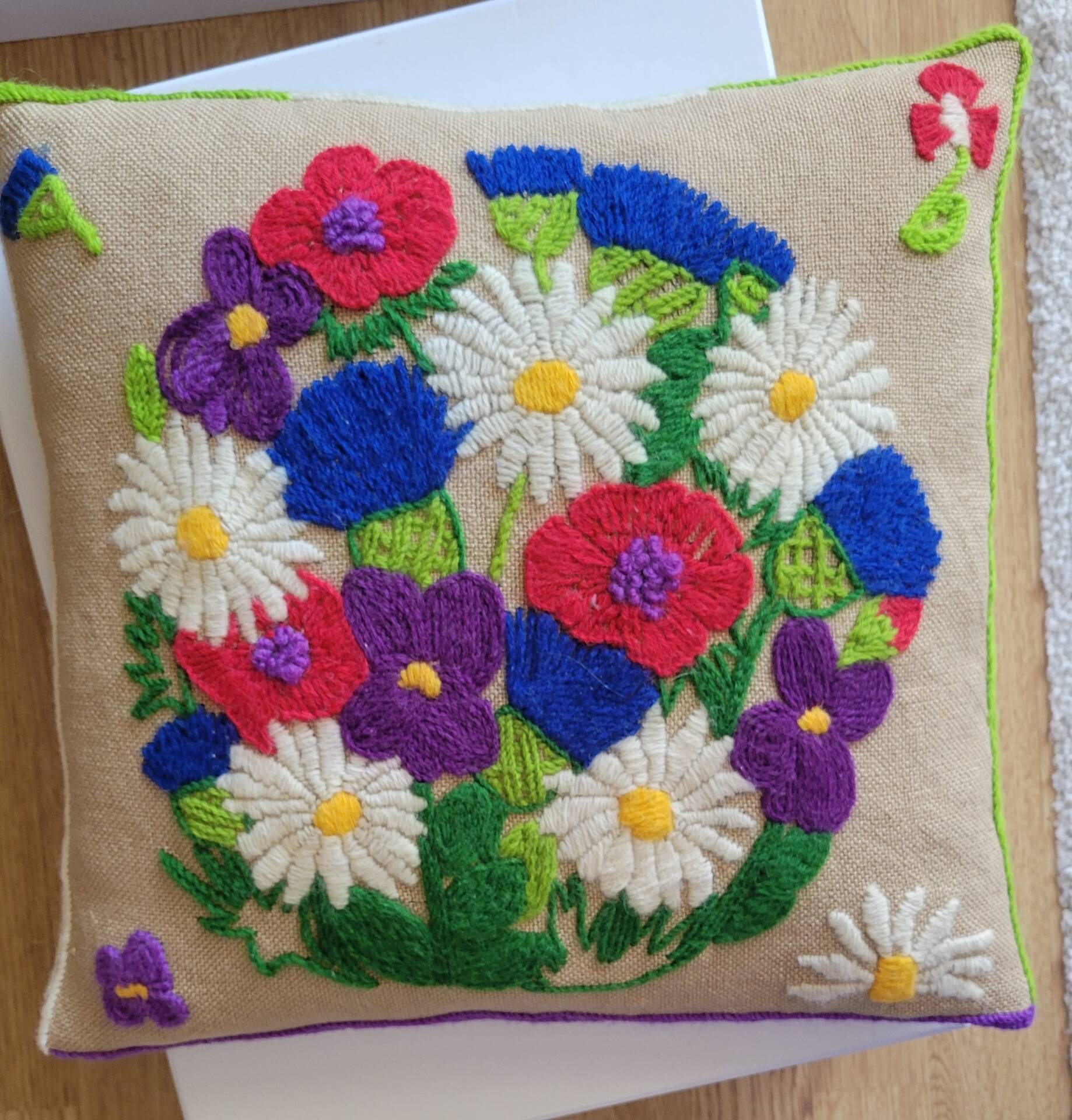 Vintage embroidered cushion
