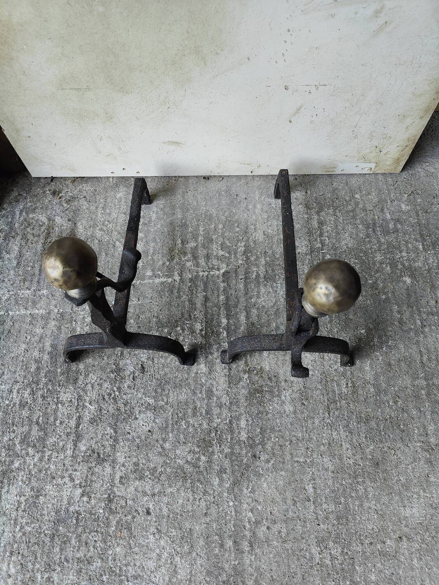 Pair of fire dogs - wrought iron and brass