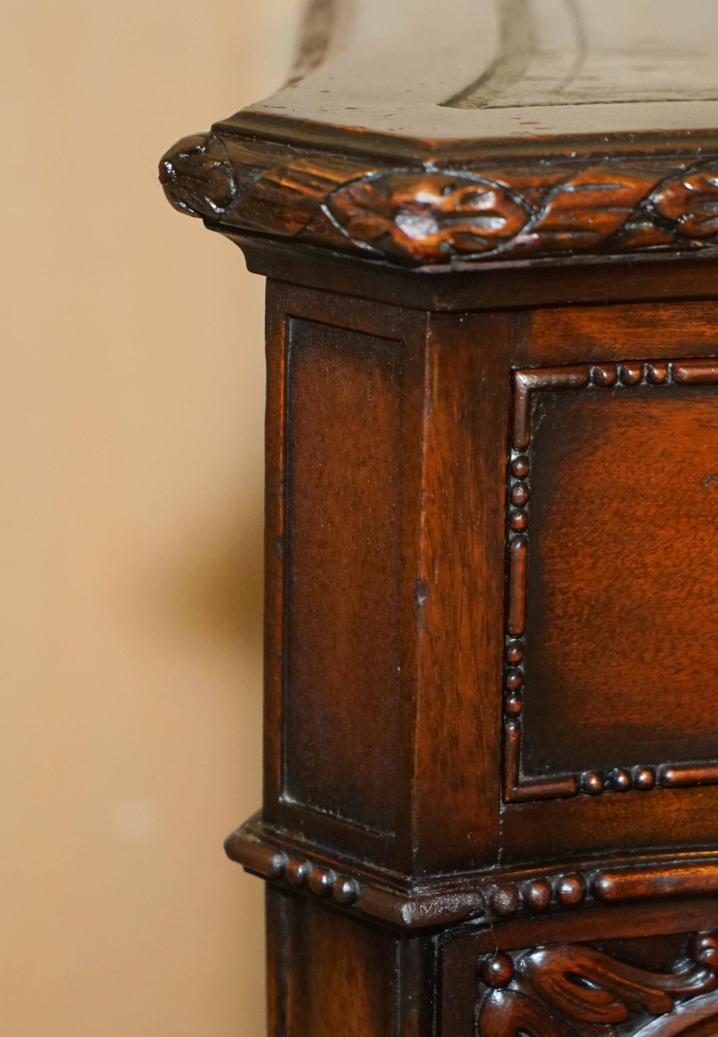 WARING & GILLOW library desk in the style of Thomas Chippendale with a leather top.