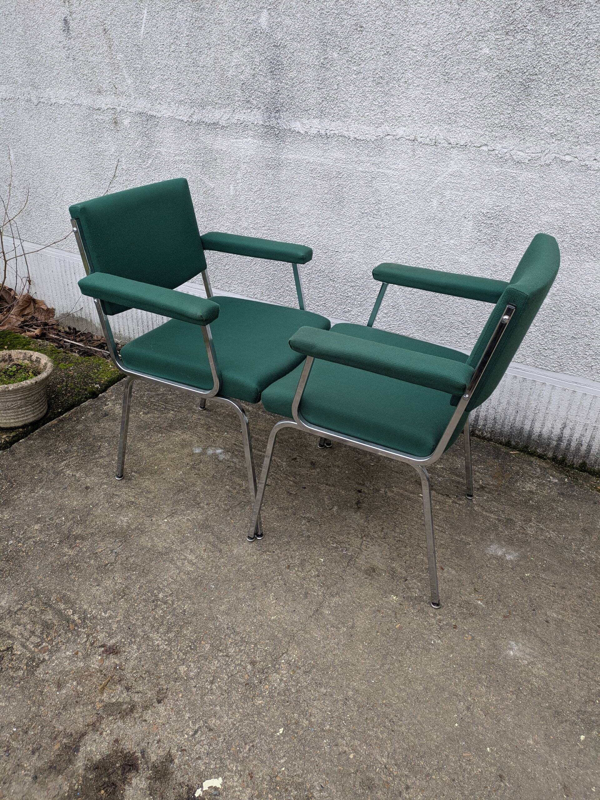 Pair of designer armchairs