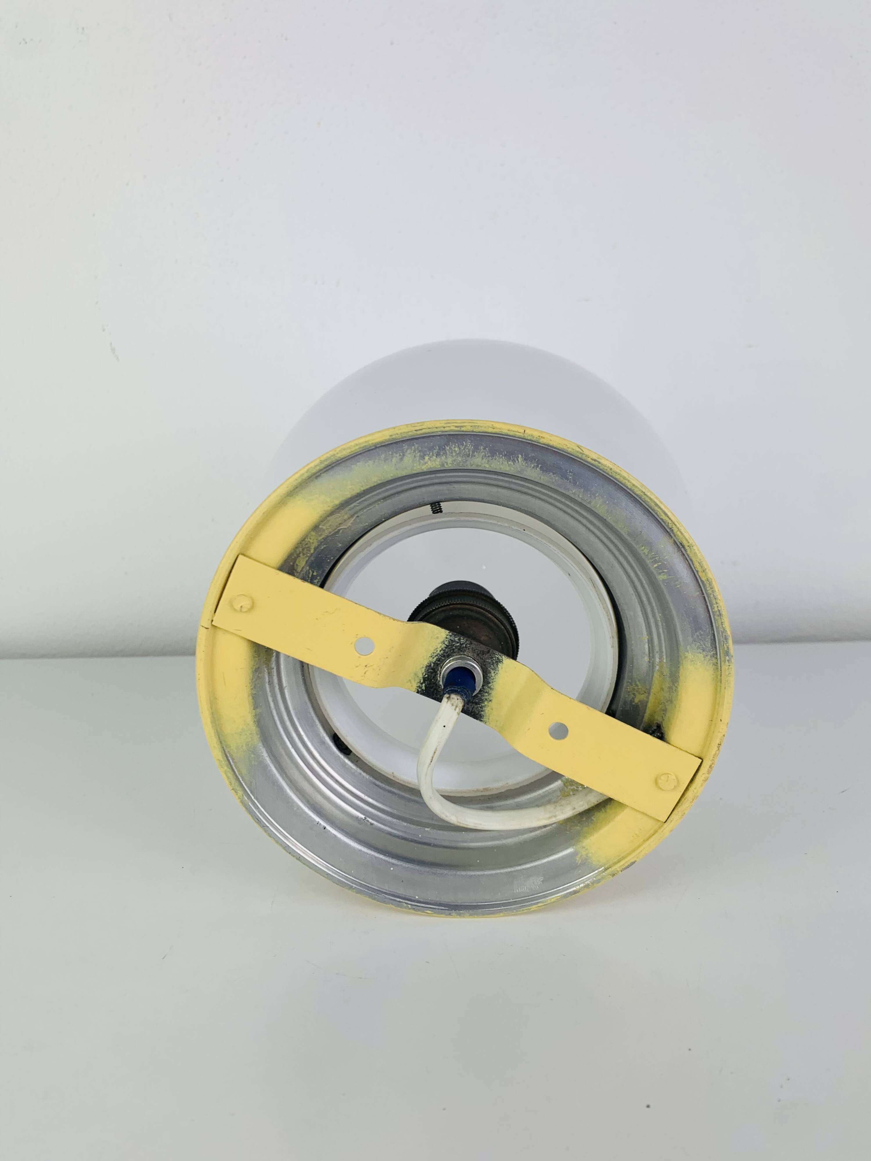 Art Deco opaline globe wall or ceiling light, yellow base
