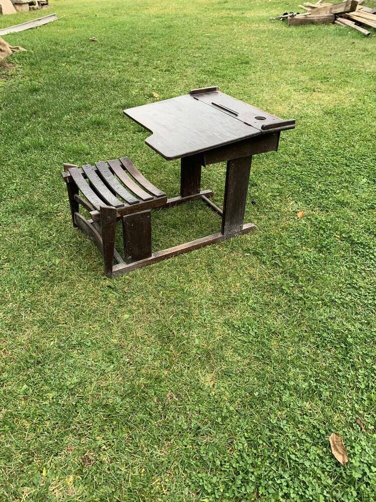 Brown painted wooden school desk for children, vintage 1920s set, slatted seat and storage.