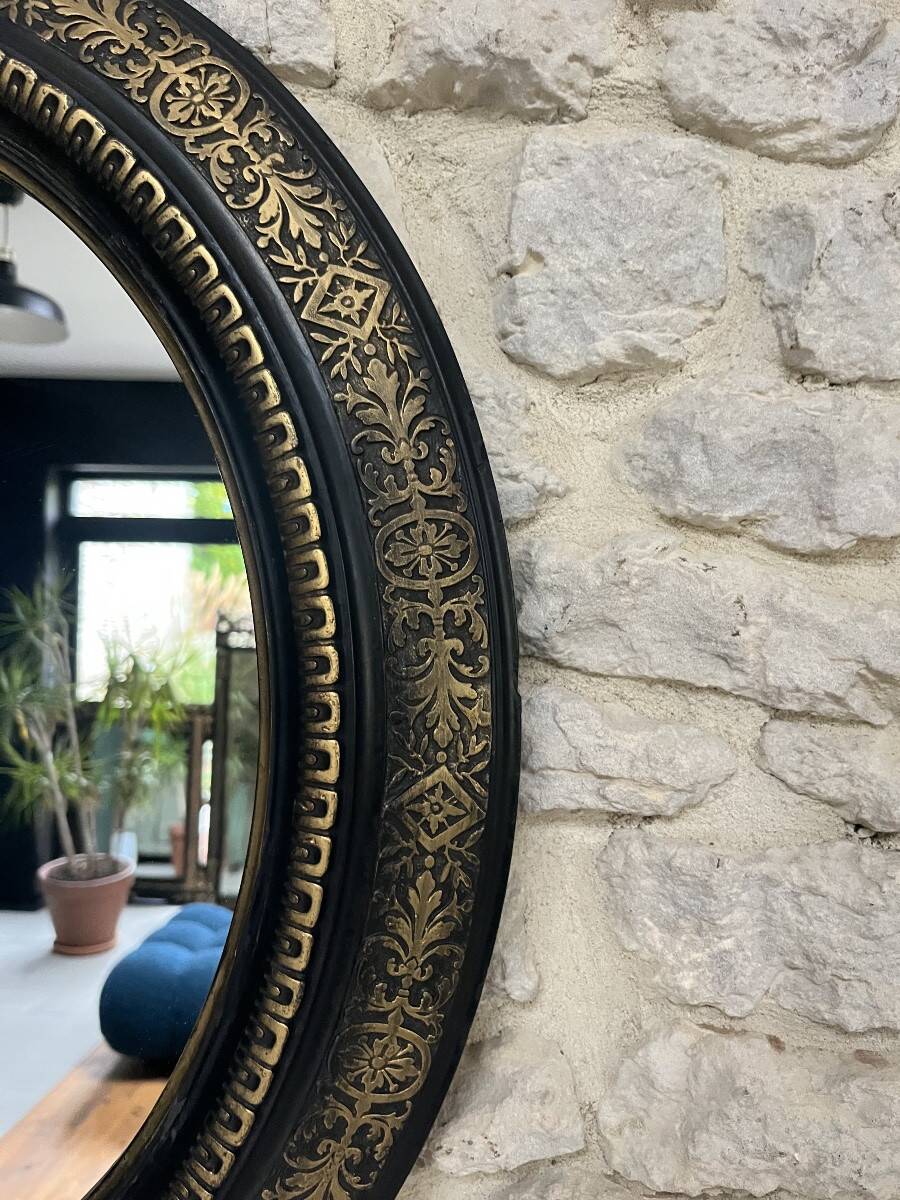 Miroir ancien 61,5/53,5cm ovale époque Napoléon III, noir et doré