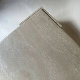 Travertine eye-shaped coffee table