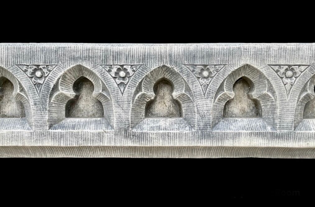 Neo-Gothic stone fireplace