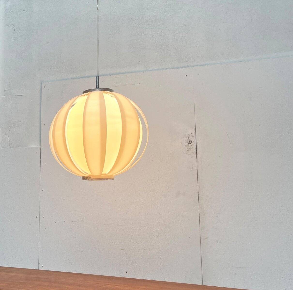 Mid-century space age lamellaire moon pendant lamp from the 1960s.