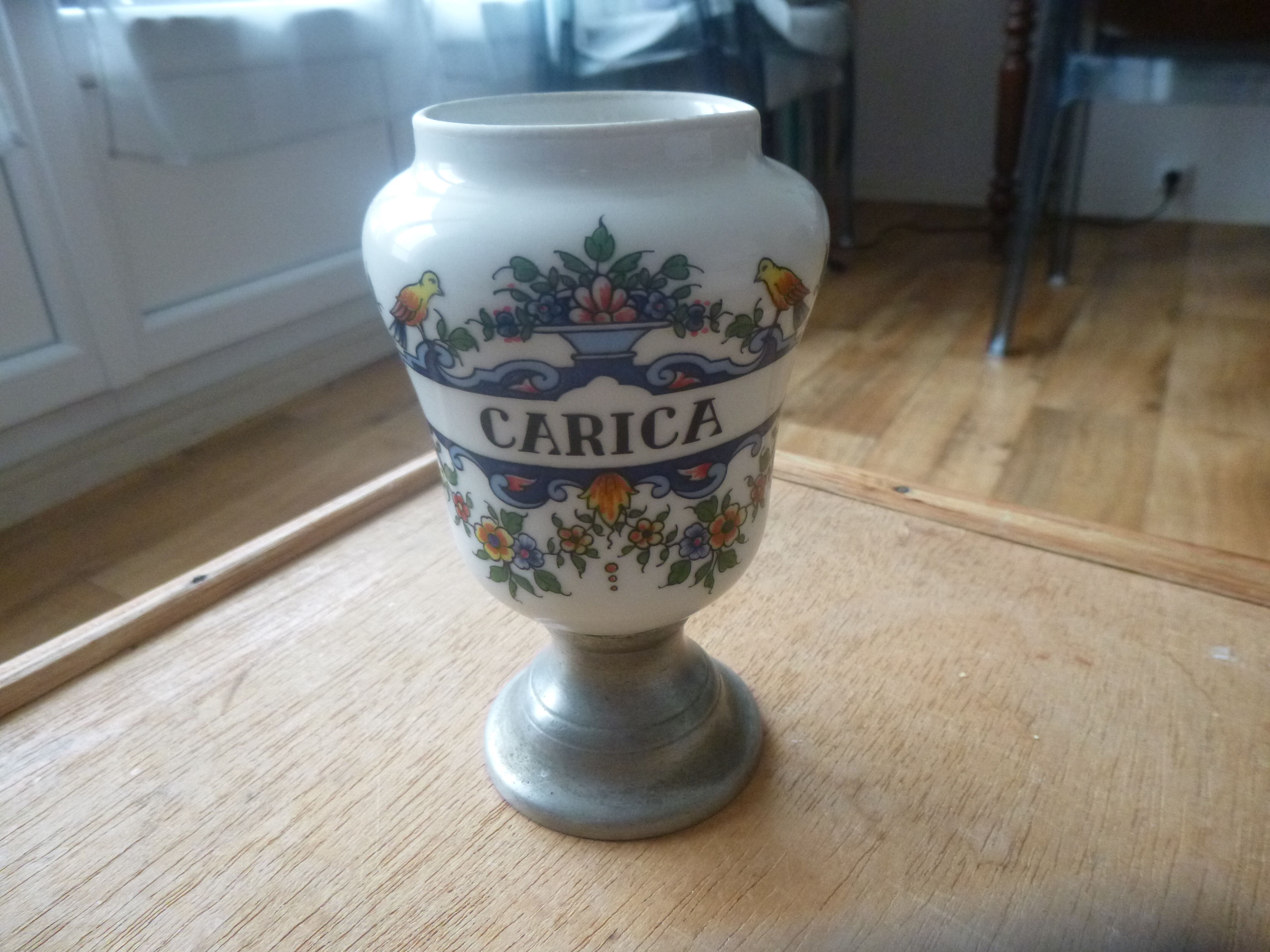 Old apothecary jar in pewter and porcelain