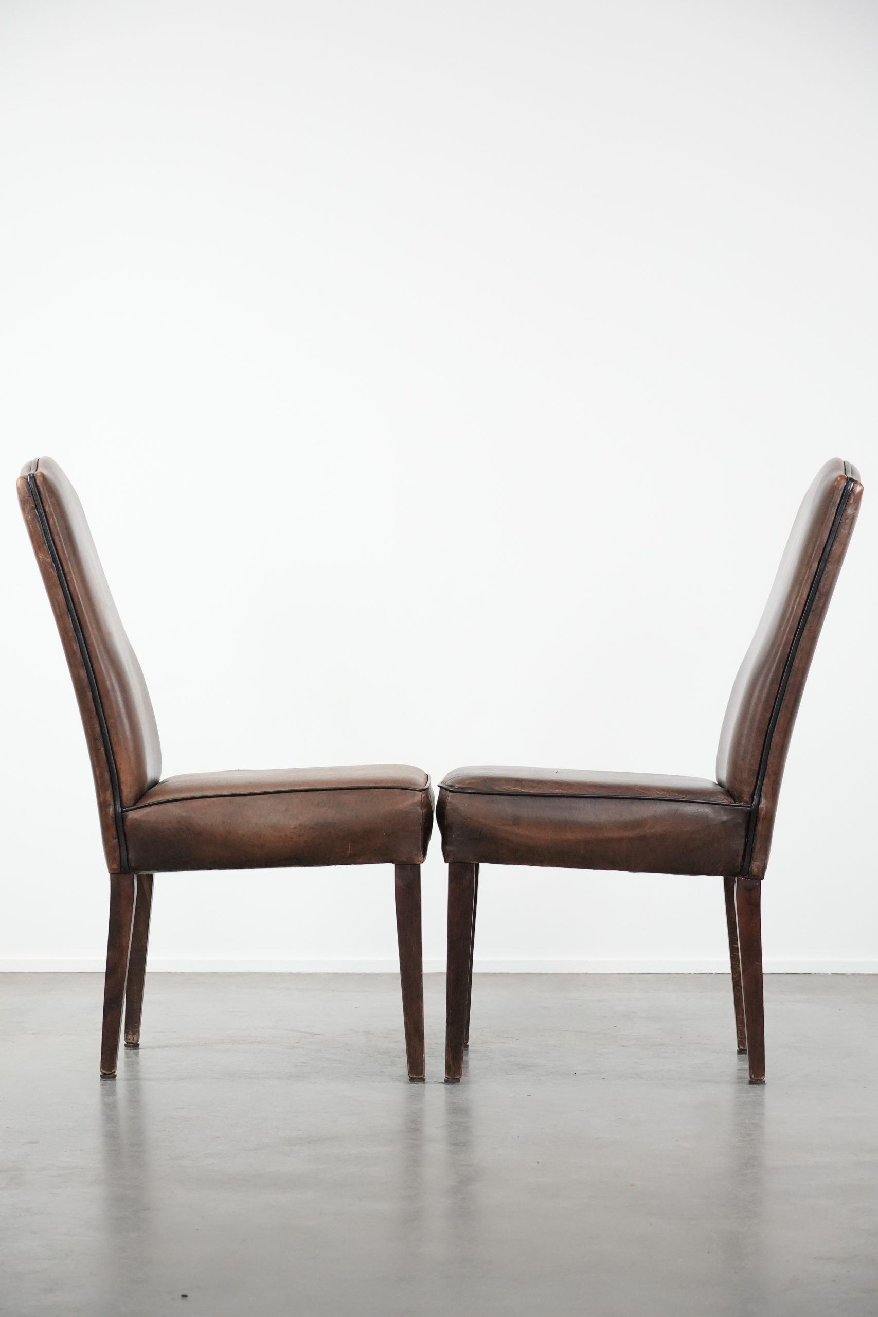 Great set of 8 stylish vintage sheepskin dining chairs with character