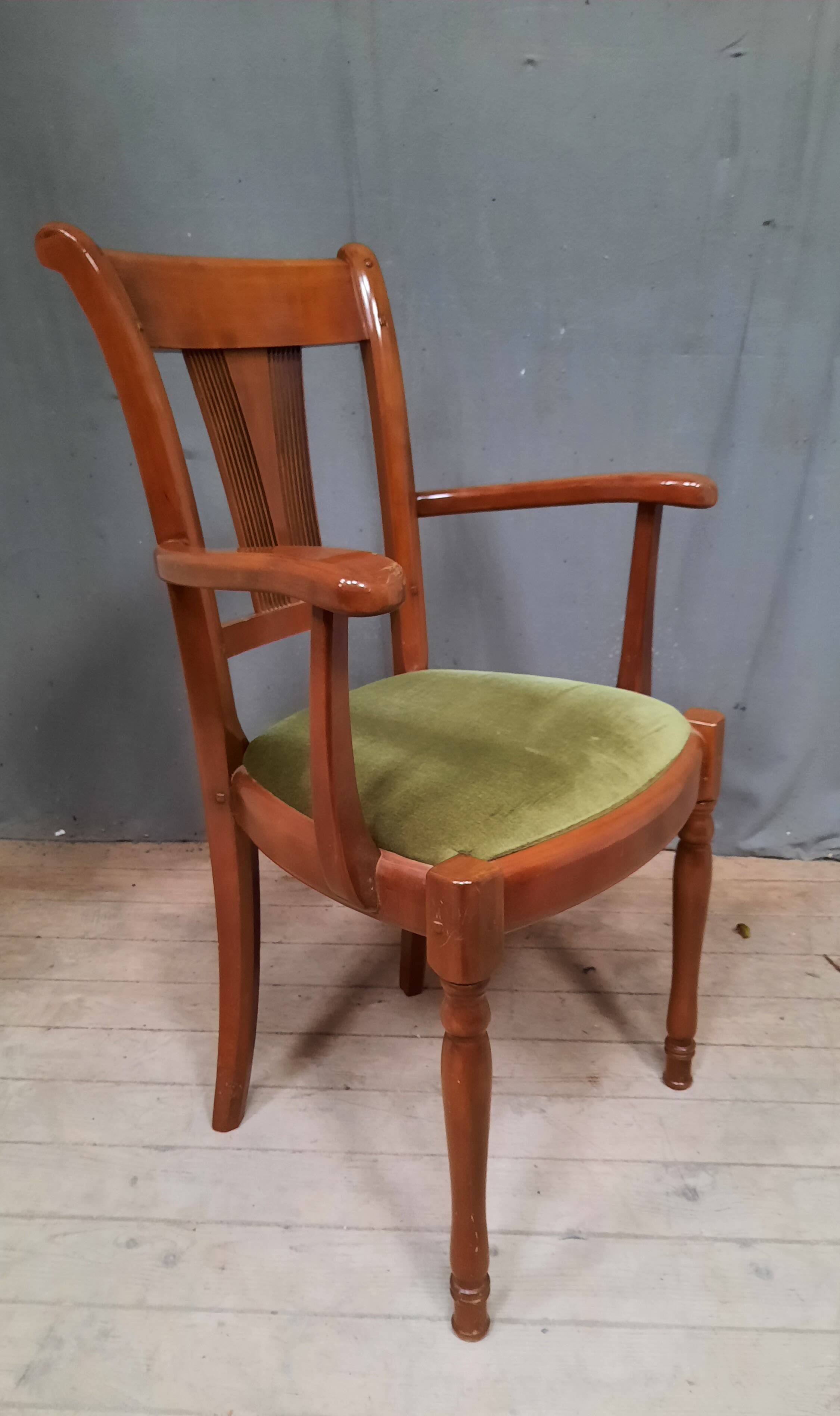 Modern armchair in varnished wood