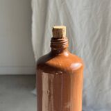 Large antique stoneware bottle with a small cork stopper