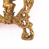 A large mirror in a gold frame, Italy, first half of the 20th century.