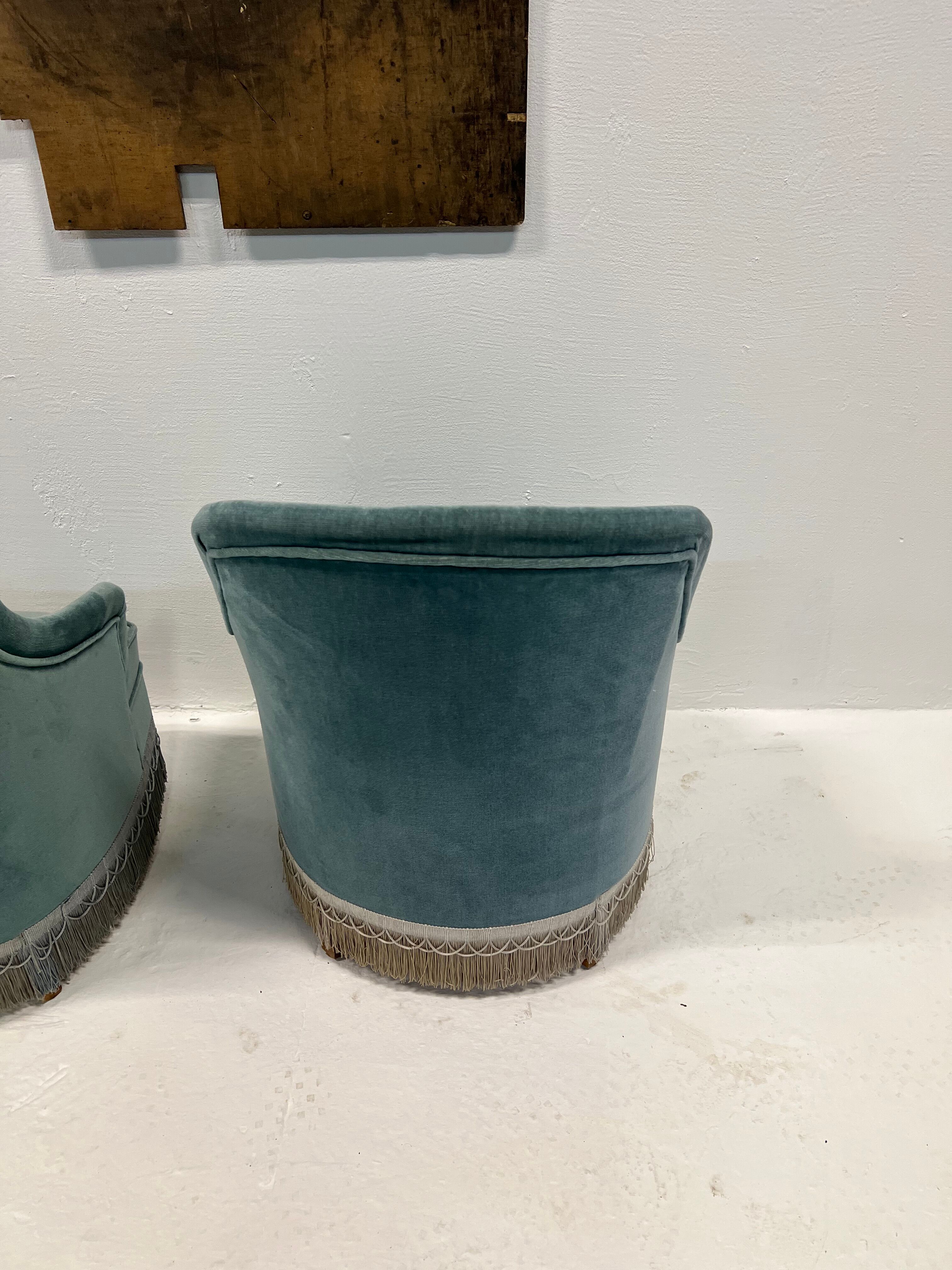 Duo of upholstered blue toad armchairs