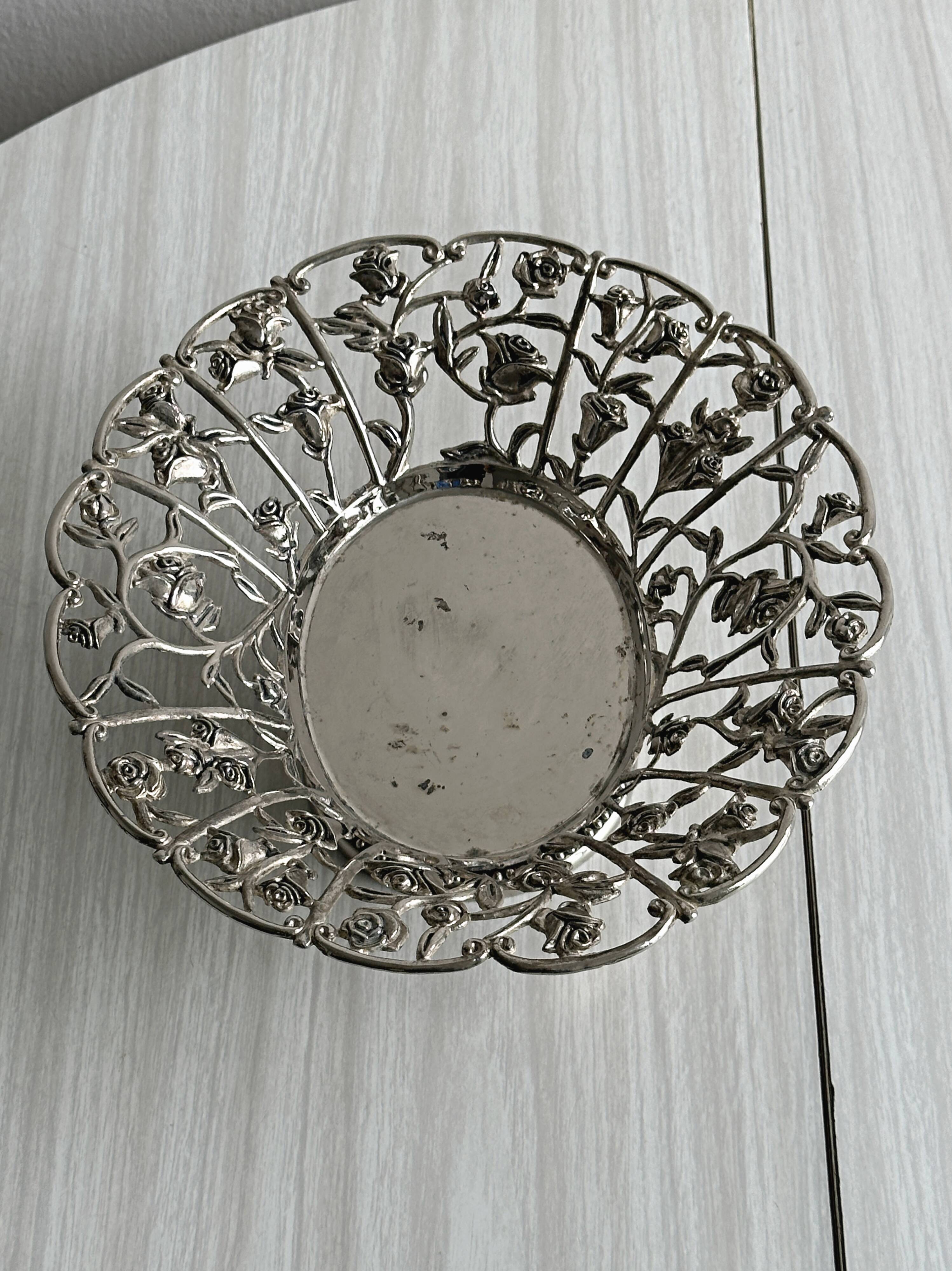 Silver-plated openwork metal stand