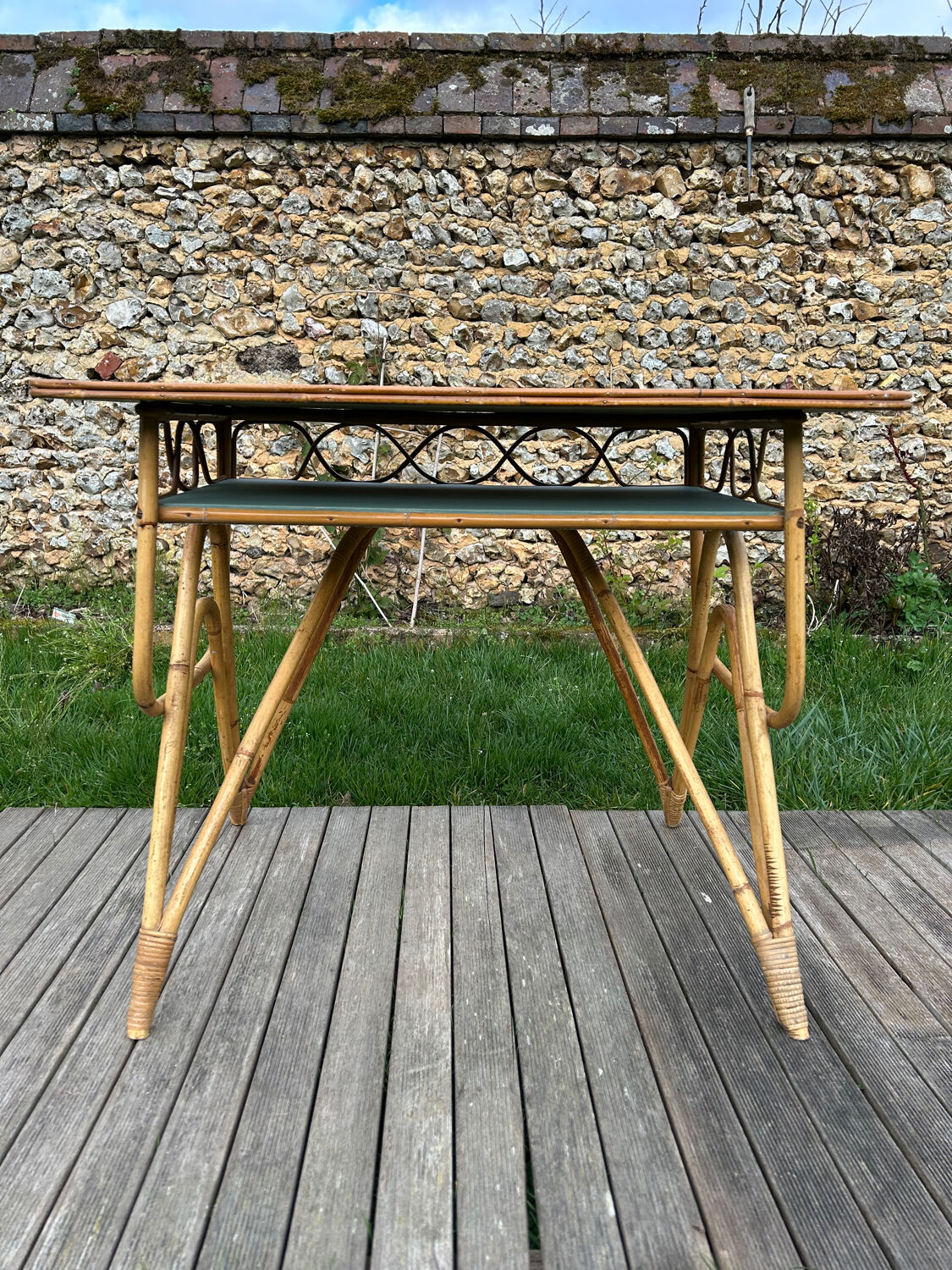 Small vintage rattan desk from the 1960s.