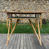 Small vintage rattan desk from the 1960s.
