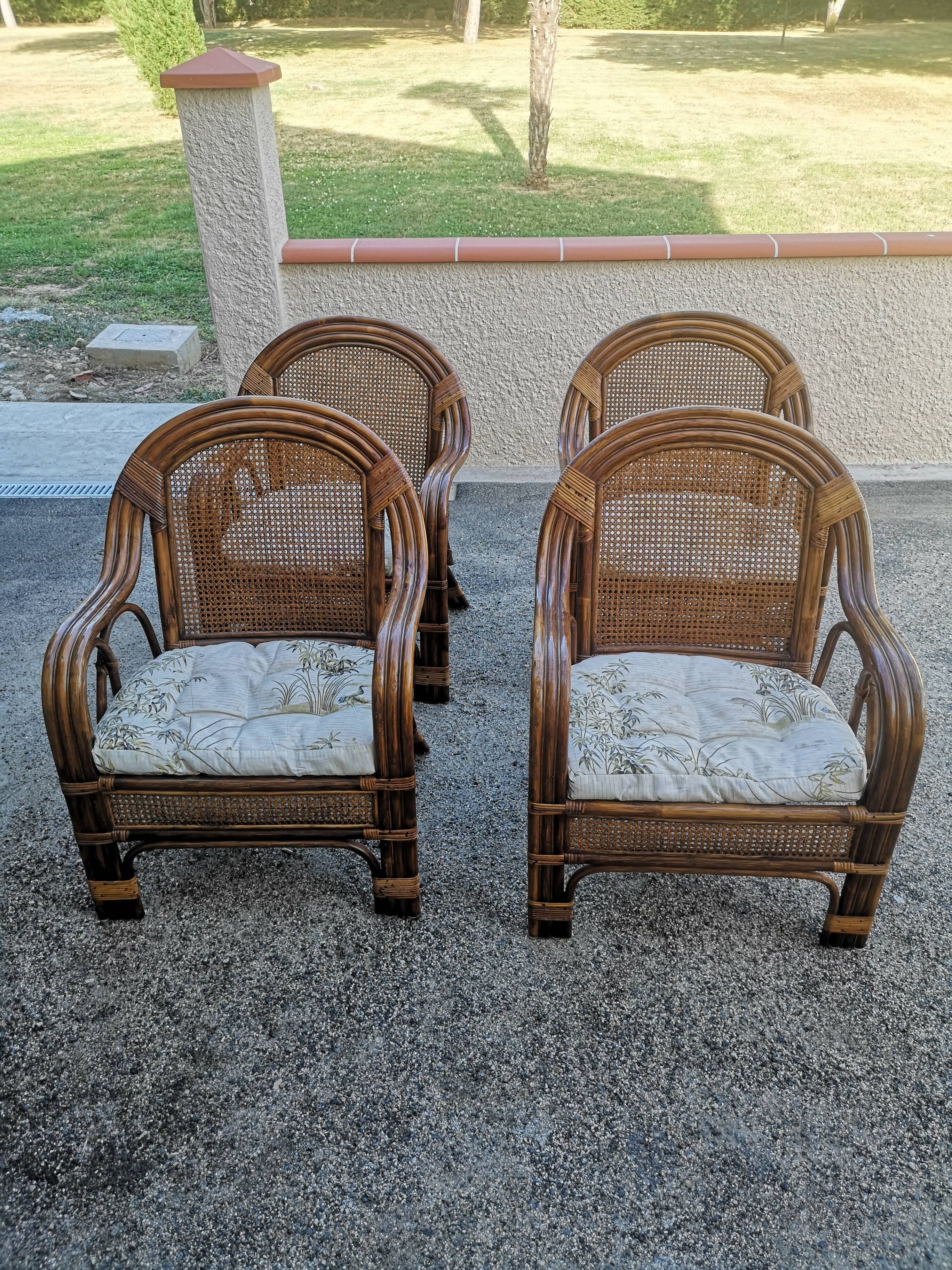 4 vintage rattan armchairs