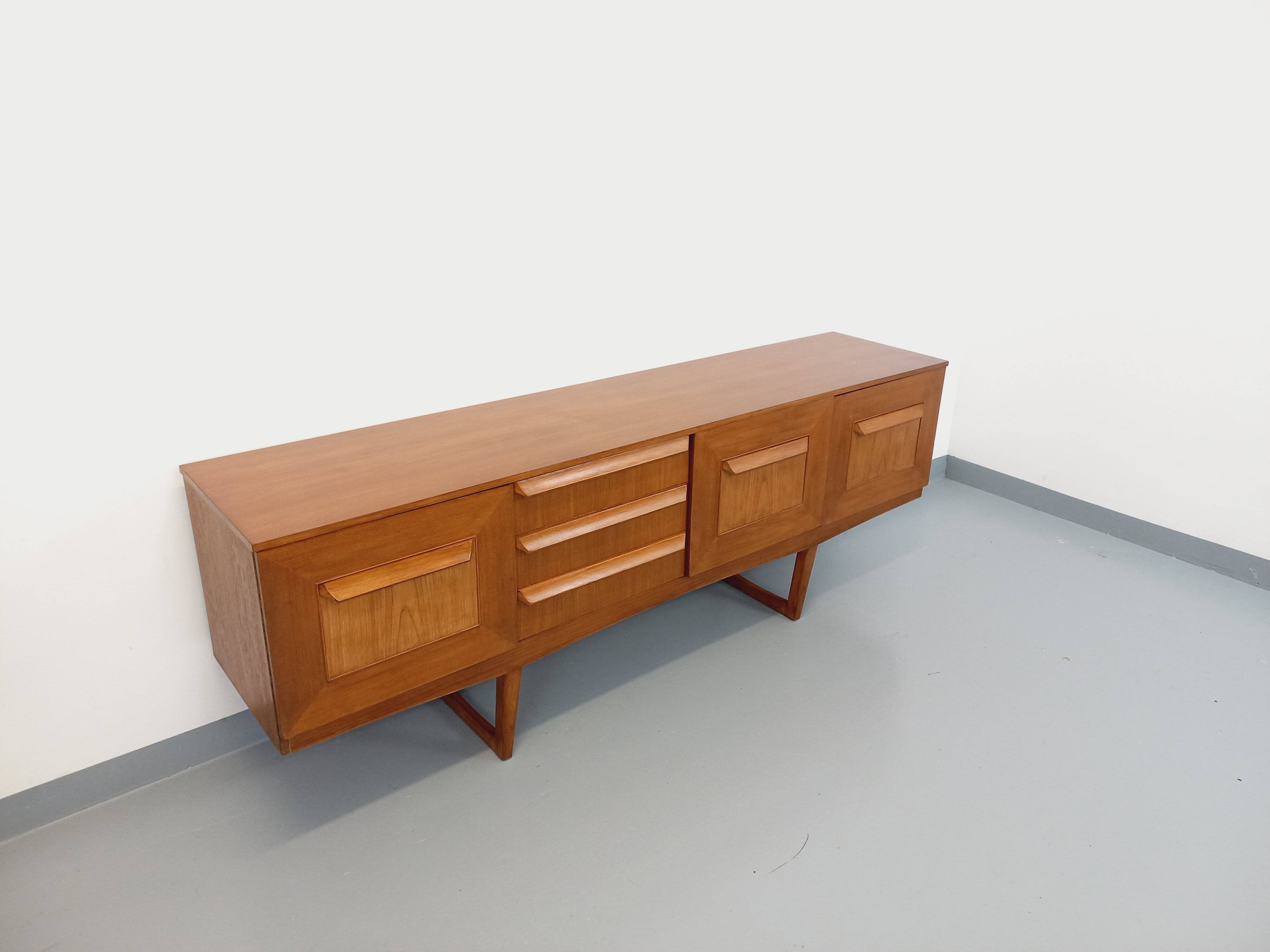 Vintage Scandinavian style sled foot sideboard in teak from the 60s