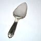 Vintage silver-plated pie server with rose decoration.