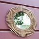 Vintage rattan sun mirror