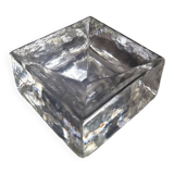 Molded glass pocket emptier