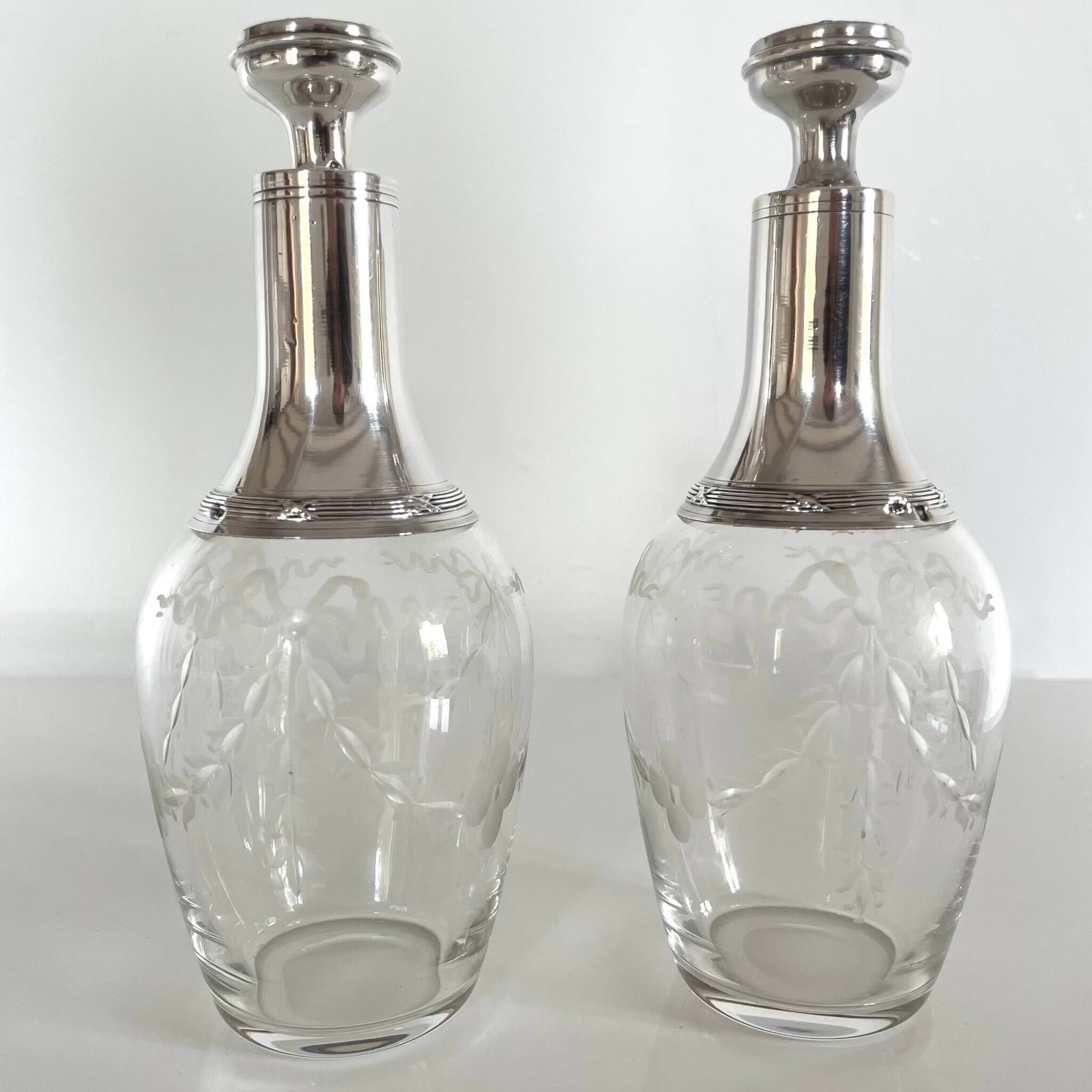Pair of crystal and silver decanters - early 20th century