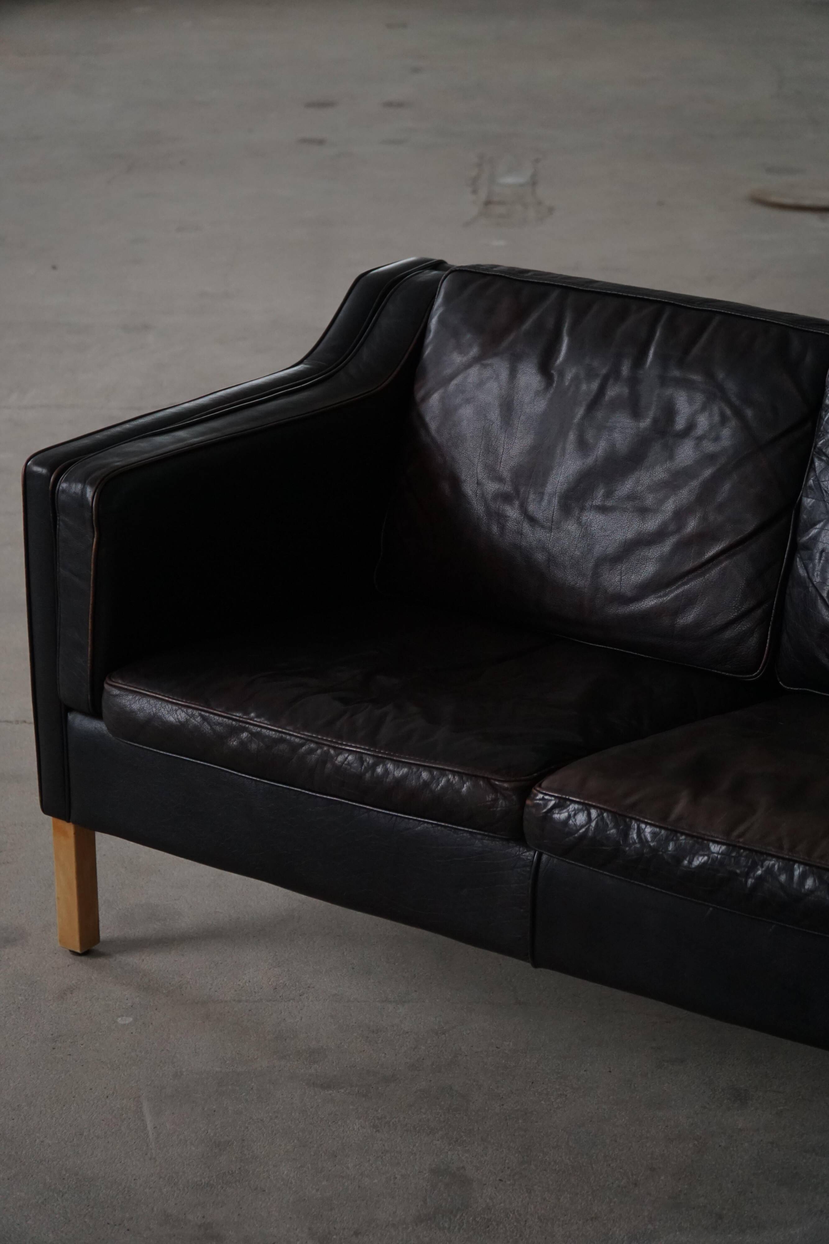 Mogens Hansen, 2-seater canapé mid-century, patinated black leather, 1970s.