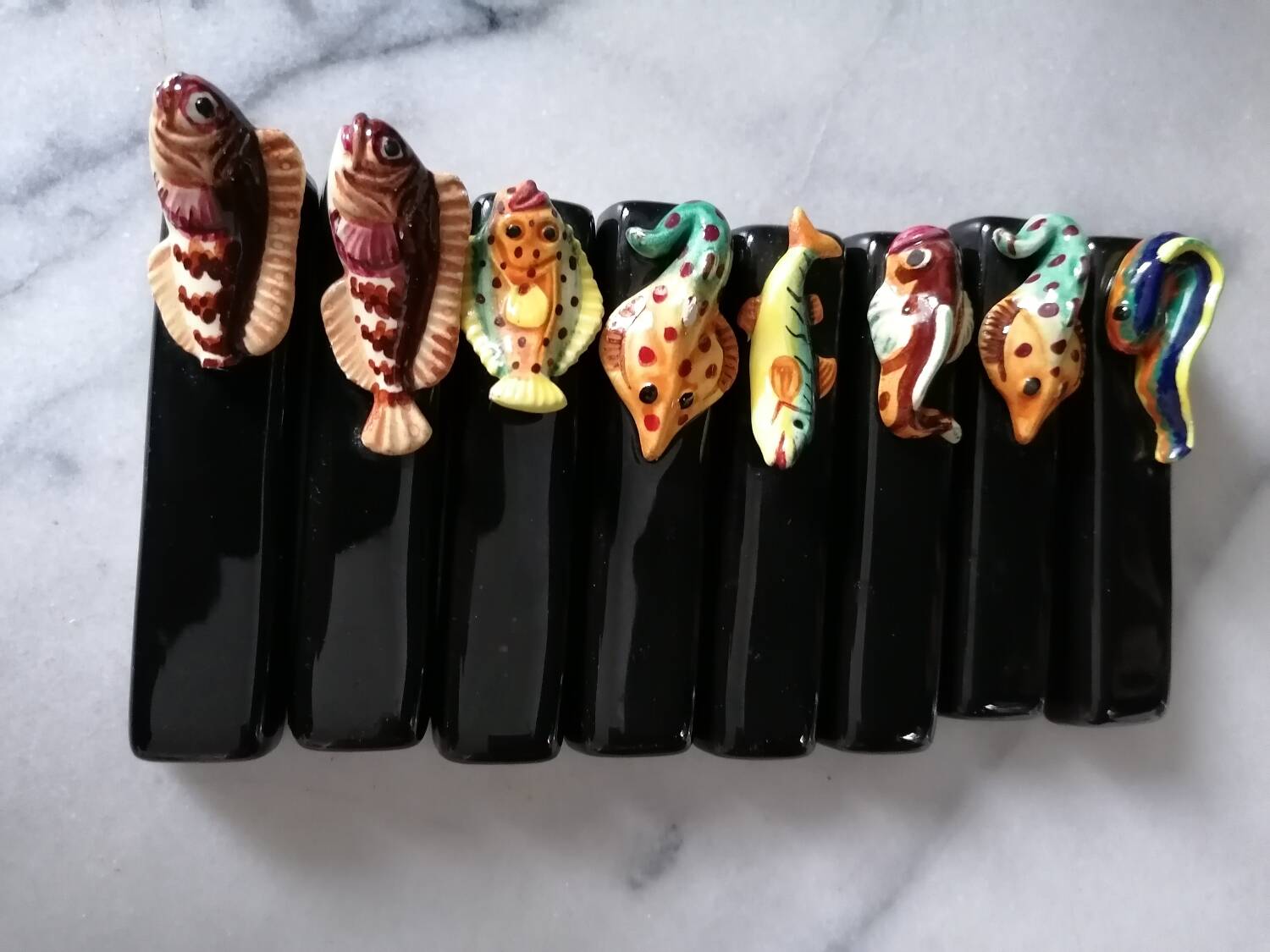 Vintage fish slip knife holders