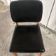 Set of 4 vintage 1960s chairs in wood and black faux leather – design
