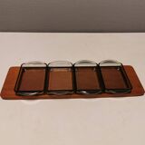 Teak Cabaret tray with four smoke coloured glass bowls, Danish and produced by Wiggers 1970s.