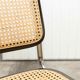 Pair of black Breuer b32 chairs and cannage