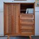 Vintage rattan cabinet with compass feet, old wicker chest of drawers