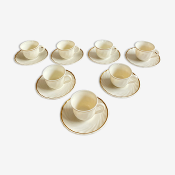 White and gold Arcopal cups