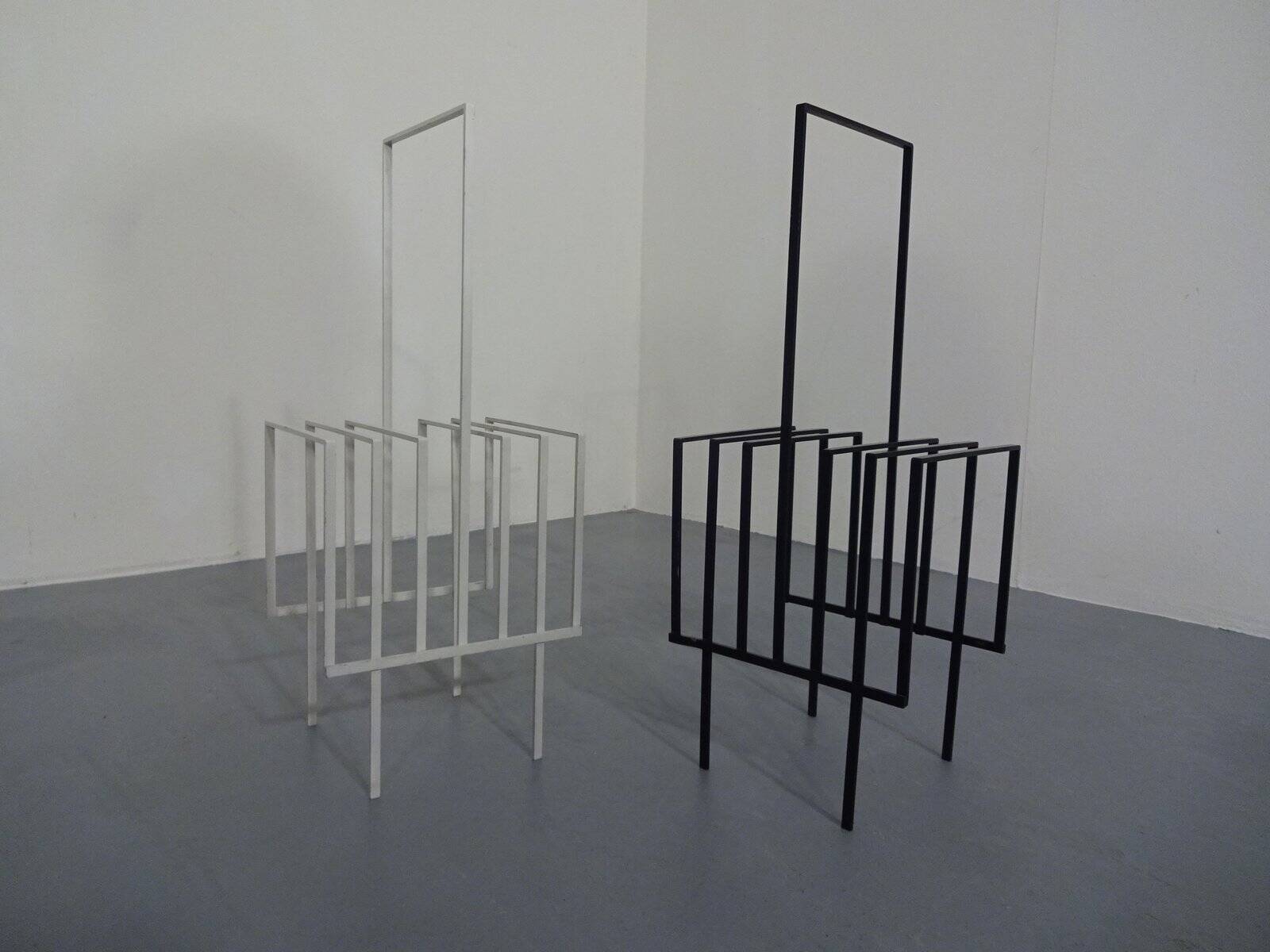 Steel magazine or record racks, 1960s, set of 2
