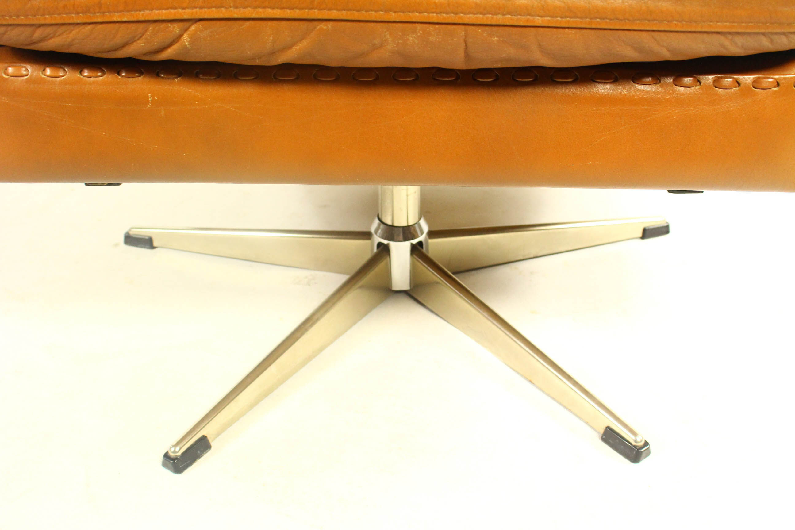 Matador swivel leather chair with ottoman by Aage Christiansen for Erhardsen & Andersen, 1960s