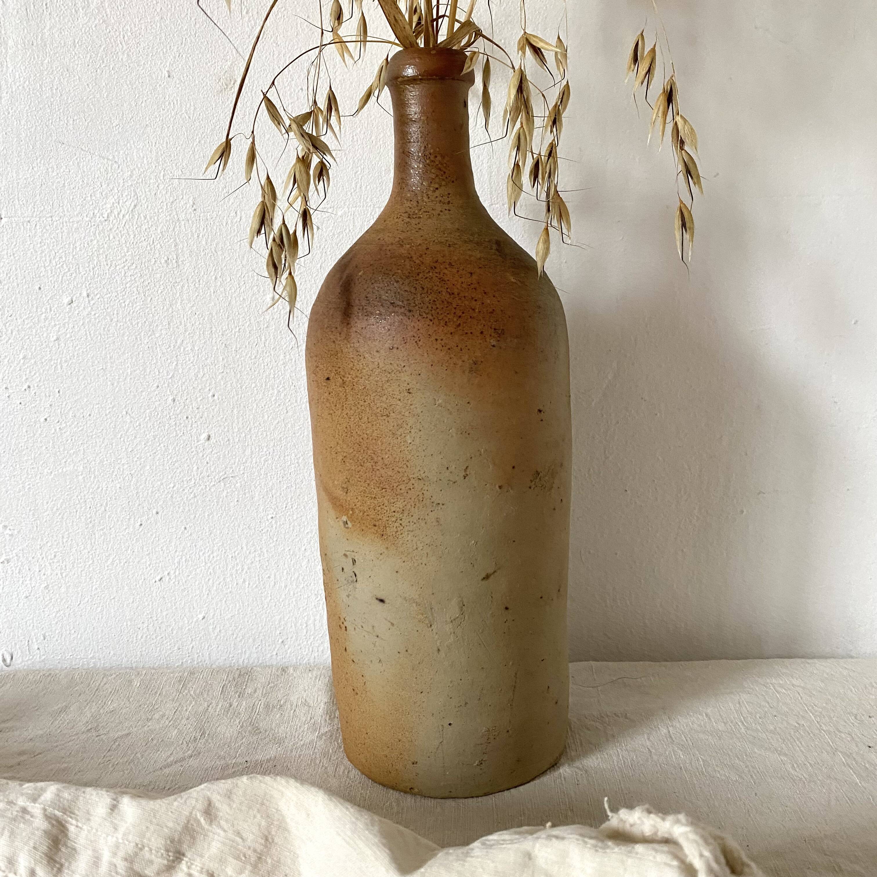 Old terracotta bottle