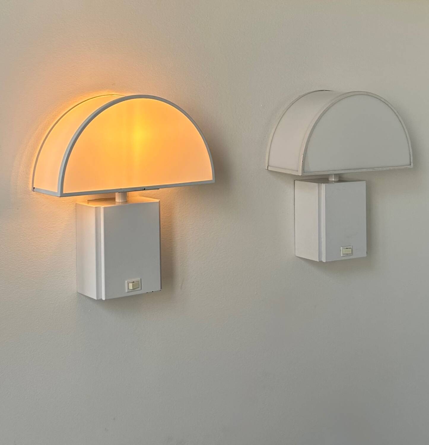 Pair of vintage Olympe Guzzini wall lights, metal and Perspex, Italy 1970
