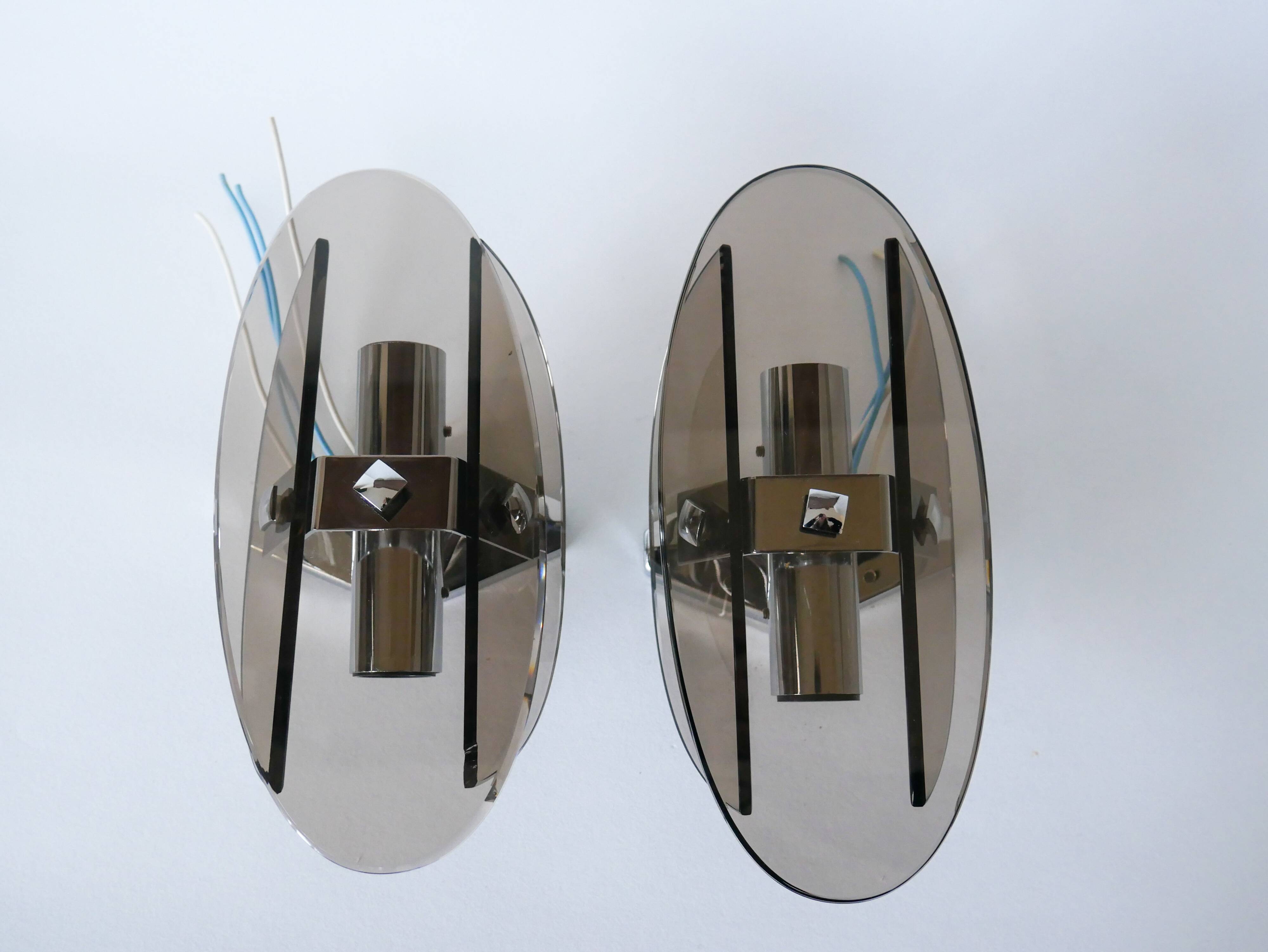 Pair of space age design smoked glass wall lights made in Italy 1970
