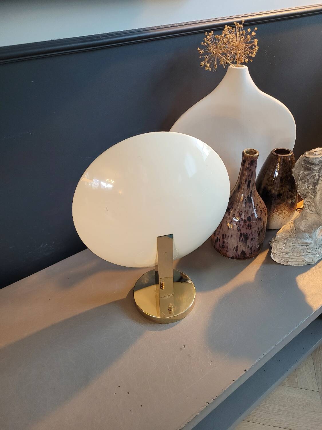 Gold and cream white saucer wall sconce