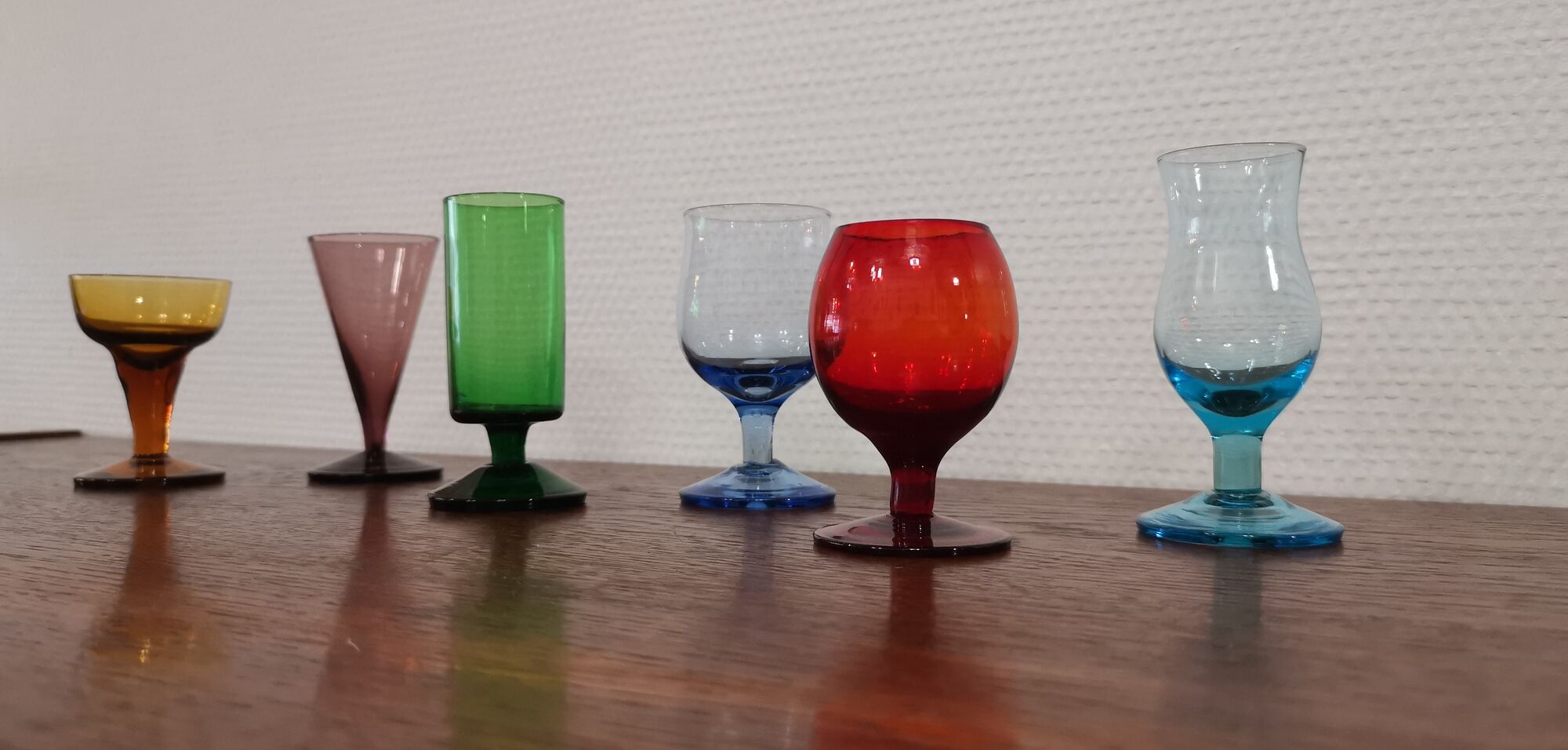 Set of 6 old liquor glasses on mismatched feet