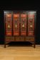 China 19th century: Red lacquer cabinet with gilding from the Qing Dynasty.