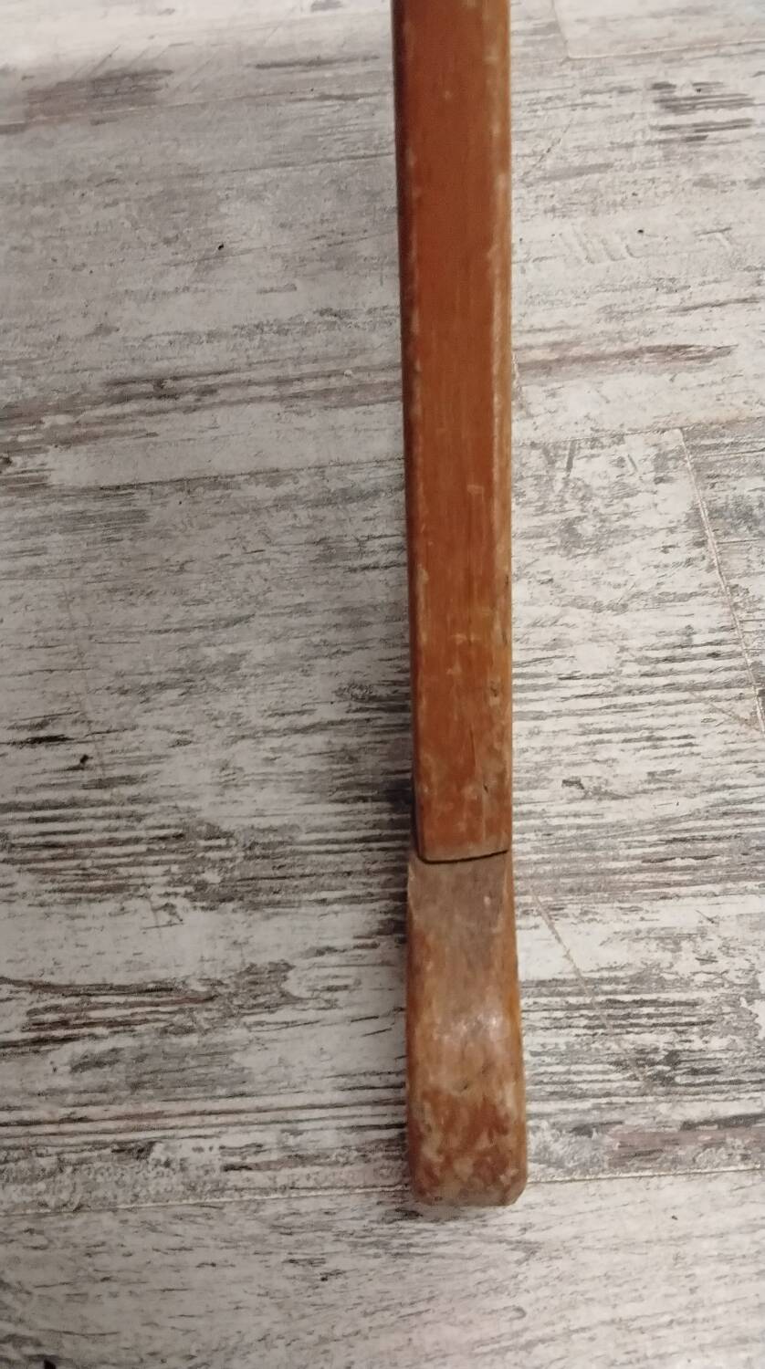 Antique rocking footrest