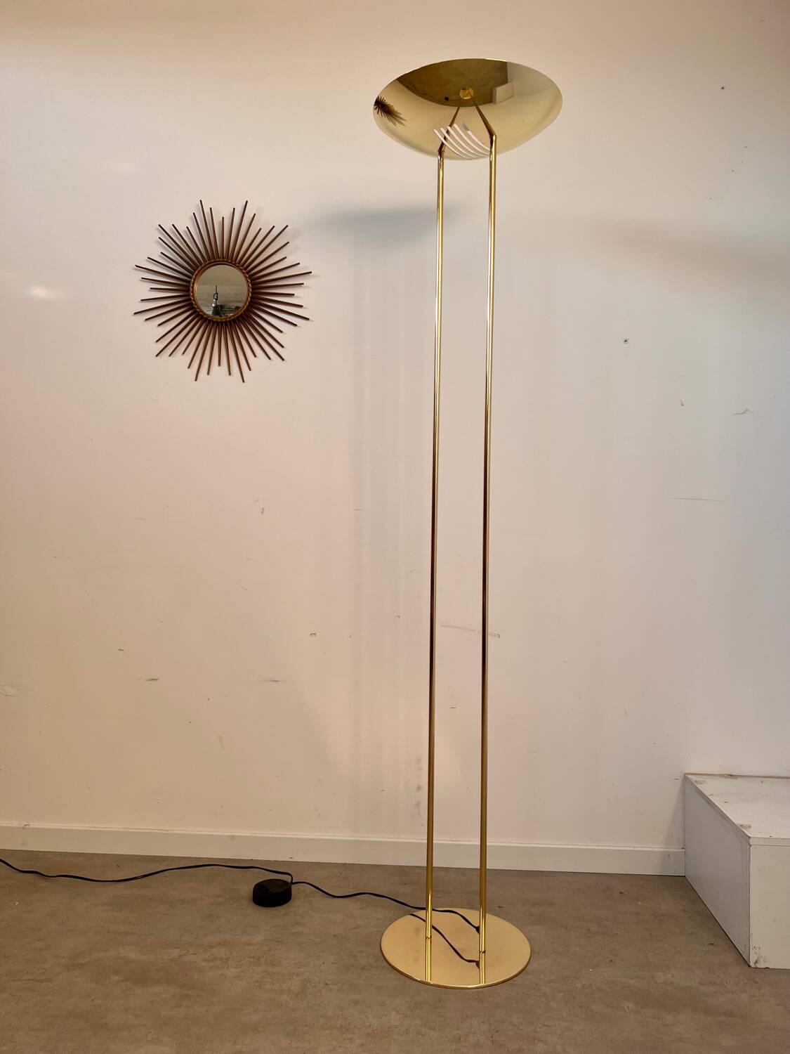 Old golden brass floor lamp with Italian design bulb from the 70s vintage