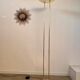 Old golden brass floor lamp with Italian design bulb from the 70s vintage