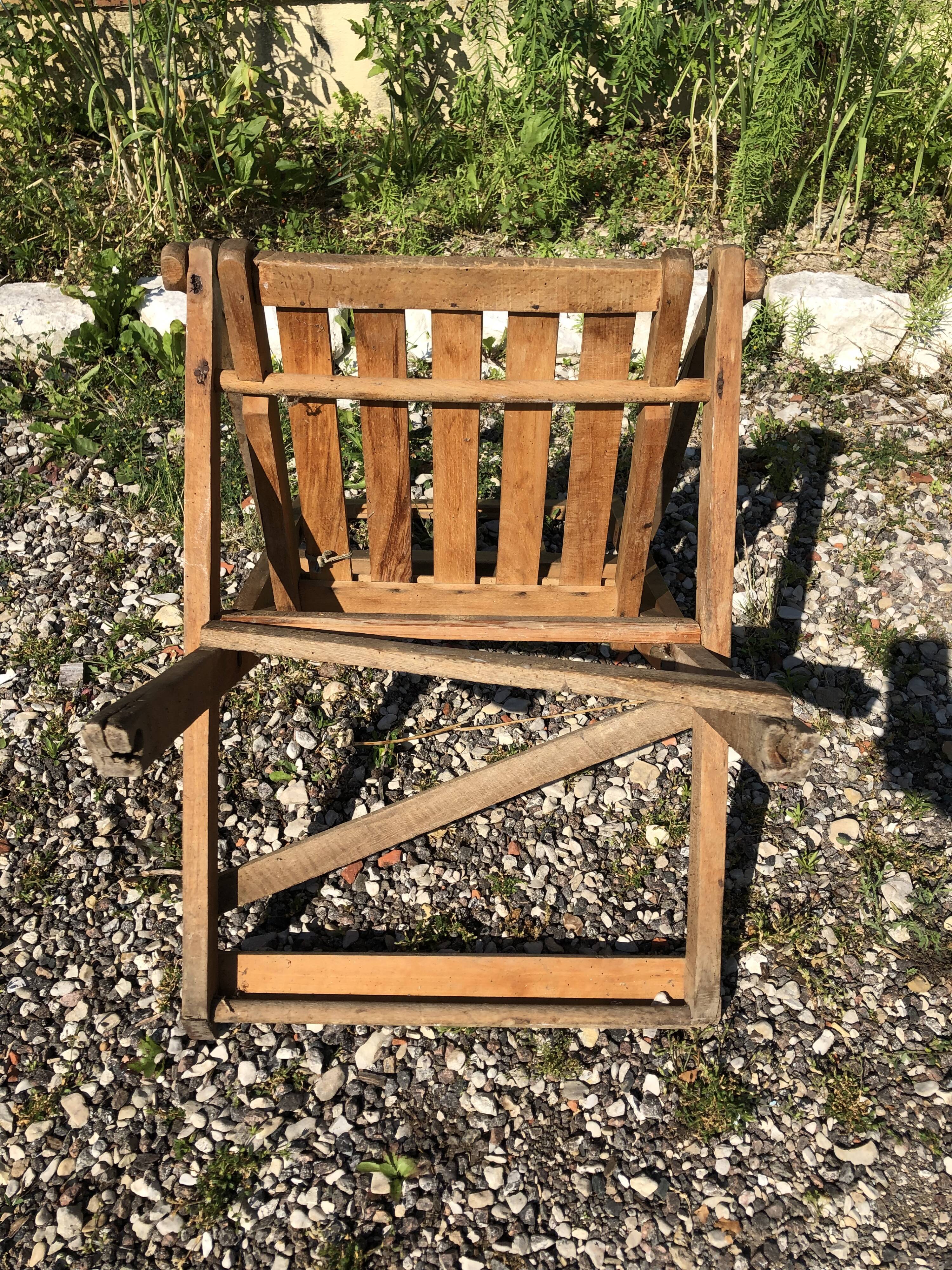 Old folding armchair wooden sitting vintage