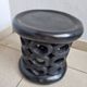 Bamiléké black stool in carved wood with rings – 33 × 35 cm