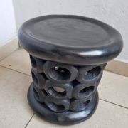 Bamiléké black stool in carved wood with rings – 33 × 35 cm