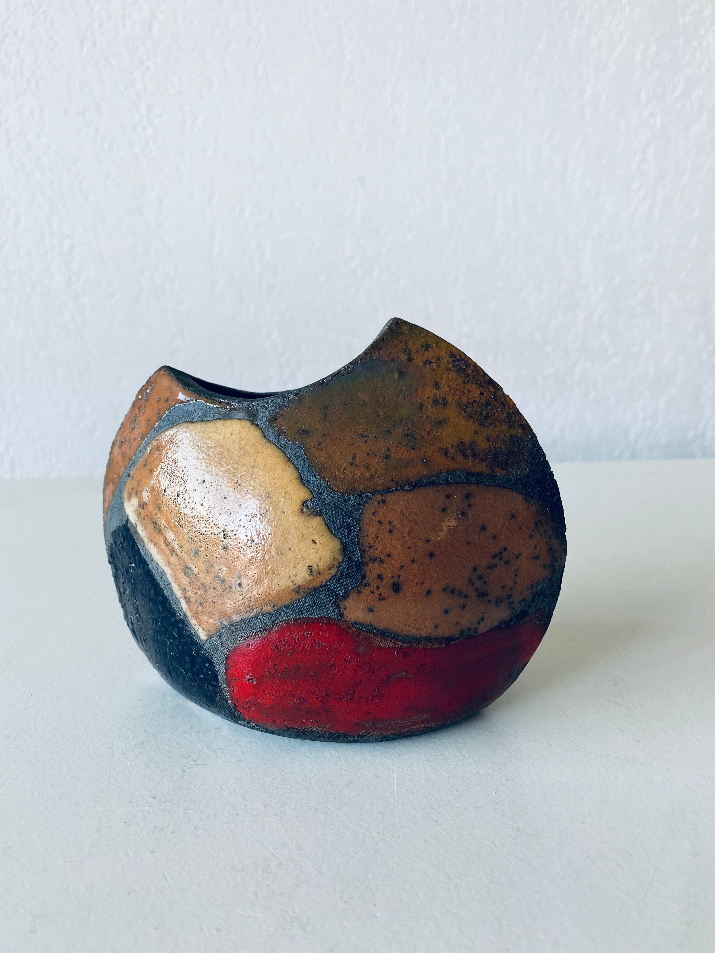 Enamelled ceramic lens vase