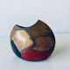 Enamelled ceramic lens vase